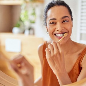 Man taking out red mouthguard