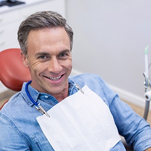 smiling patient in the dentist’s chair