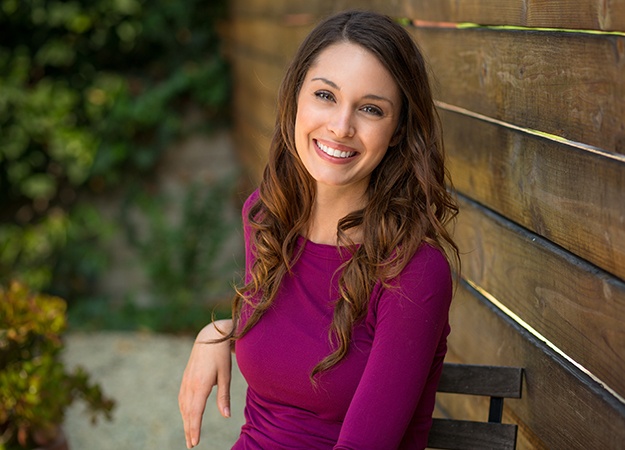 Young woman smiling with prepless veneers in Raleigh