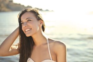 Smiling woman on the beach